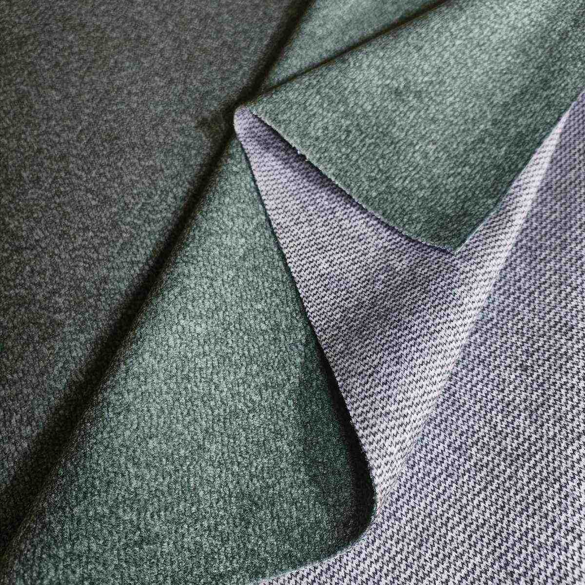 Gros plan sur la texture du tissu thermique anti froid Meva — armure serrée recto verso